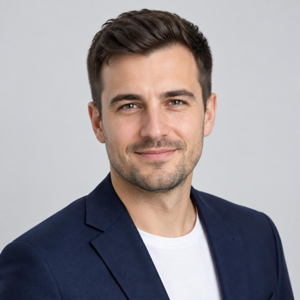 Studio portrait of a Polish man in a casual blazer